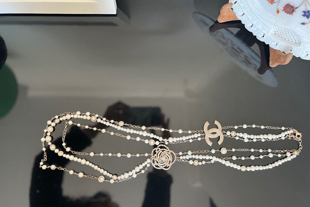 Authentic Chanel Half Faux Pearl Pendant