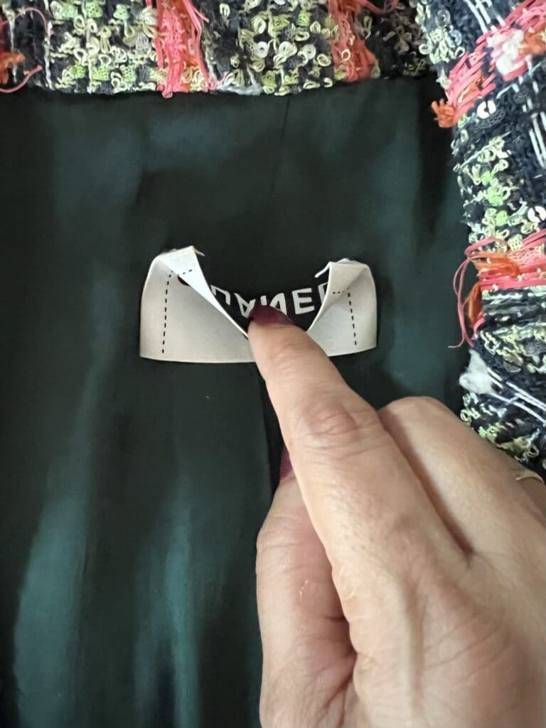 Poor quality stitching on Chanel jacket tag
